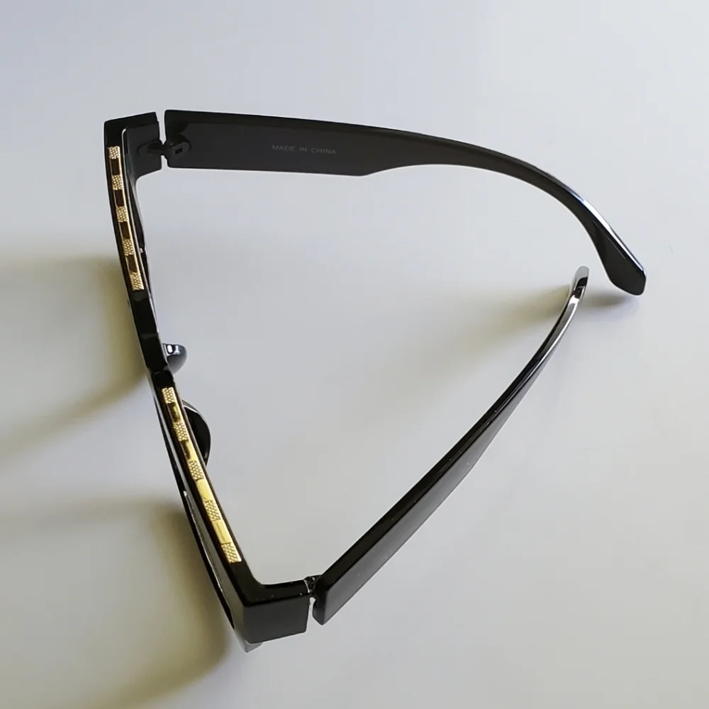 Black Glasses with Gold Accents